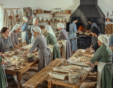 Women working together in the settlement bakery